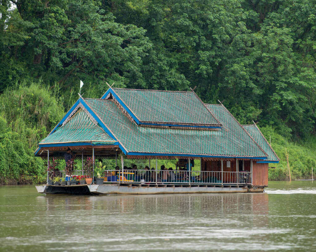 House church on a boat going down a river 