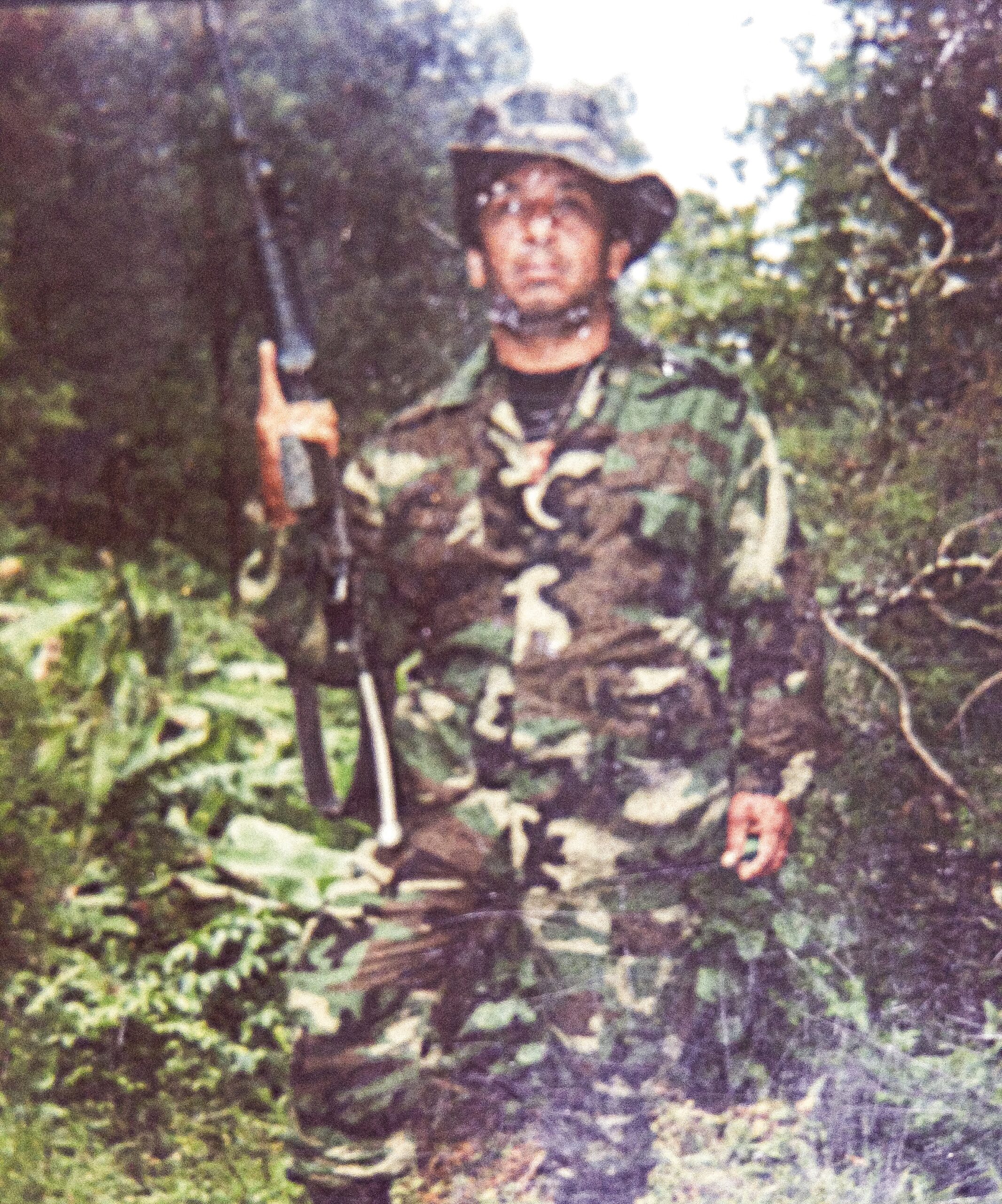 Man in Colombia dressed in Guerilla clothing