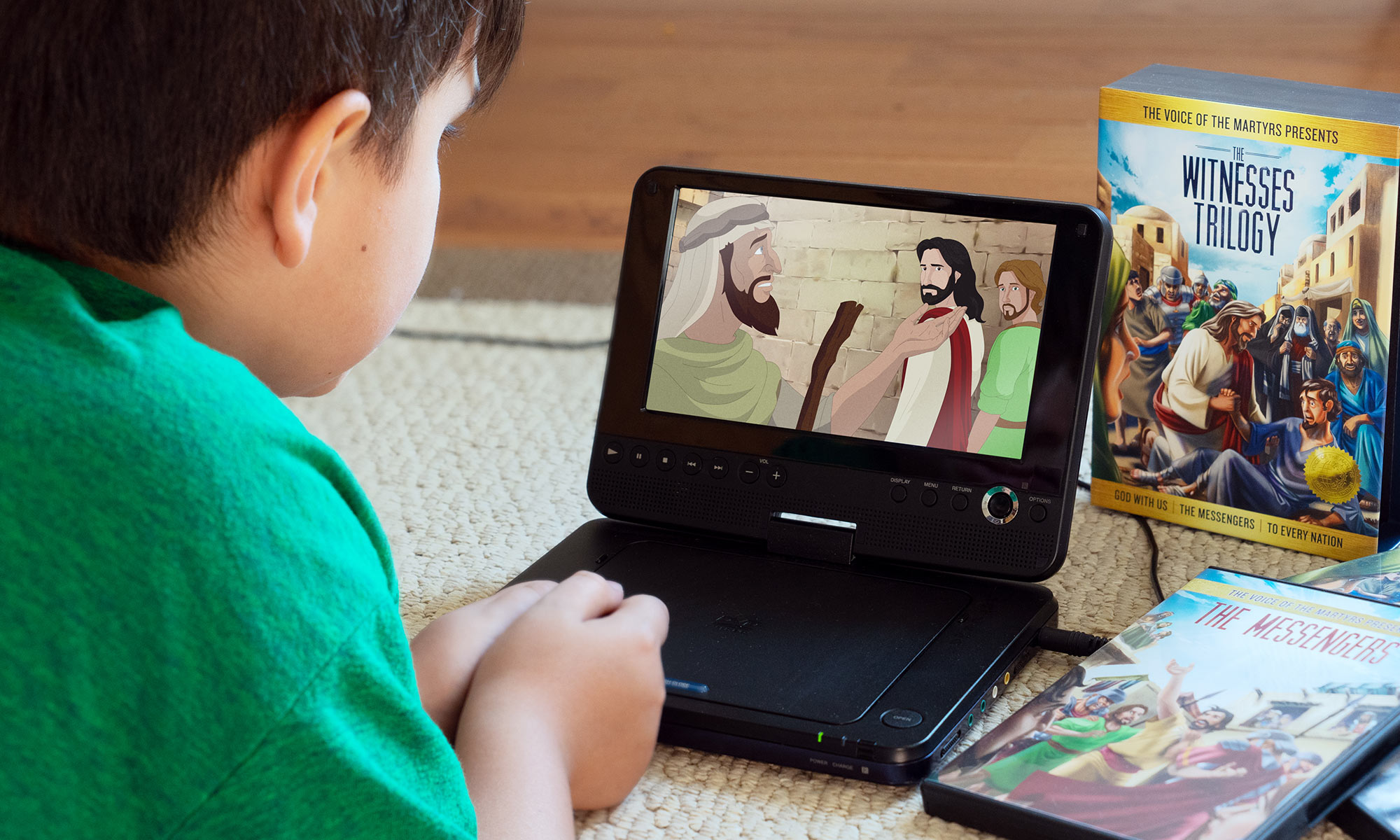 Kid watching animated movie on portable player