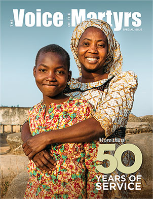 Magazine cover showing smiling woman hugging boy