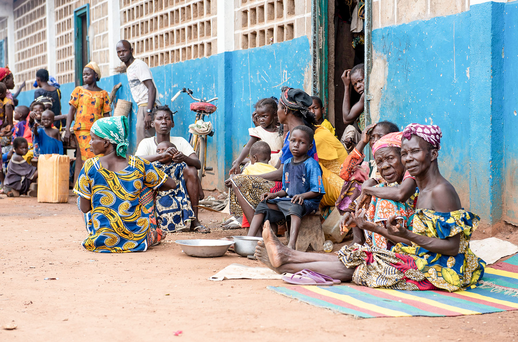 Recently displaced Christians sit in the courtyard of the Kaga Bandoro school. Three days earlier, they fled a 4 a.m. Islamist attack on their village with only the clothes they were wearing.