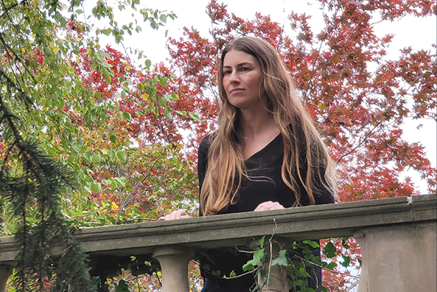 Anita looking over railing