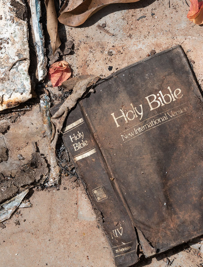 Singed Bible and other burnt papers