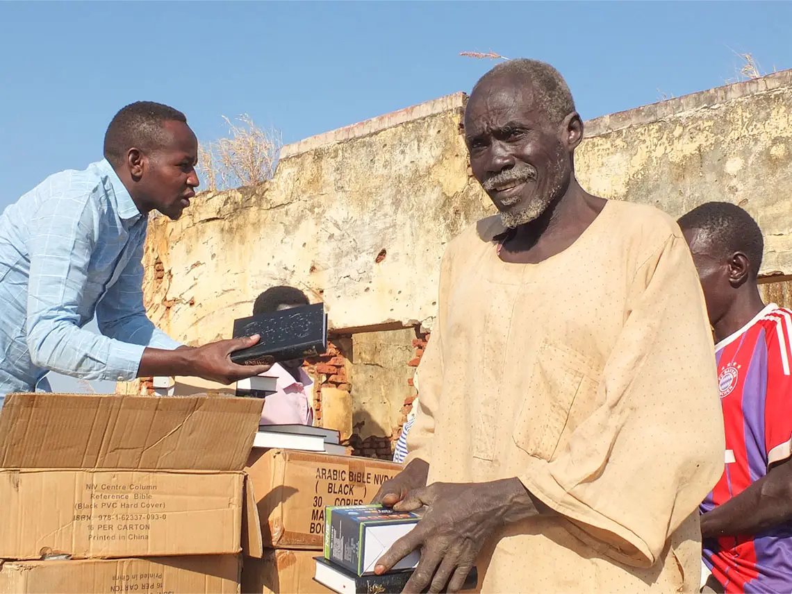 Handing out Bibles