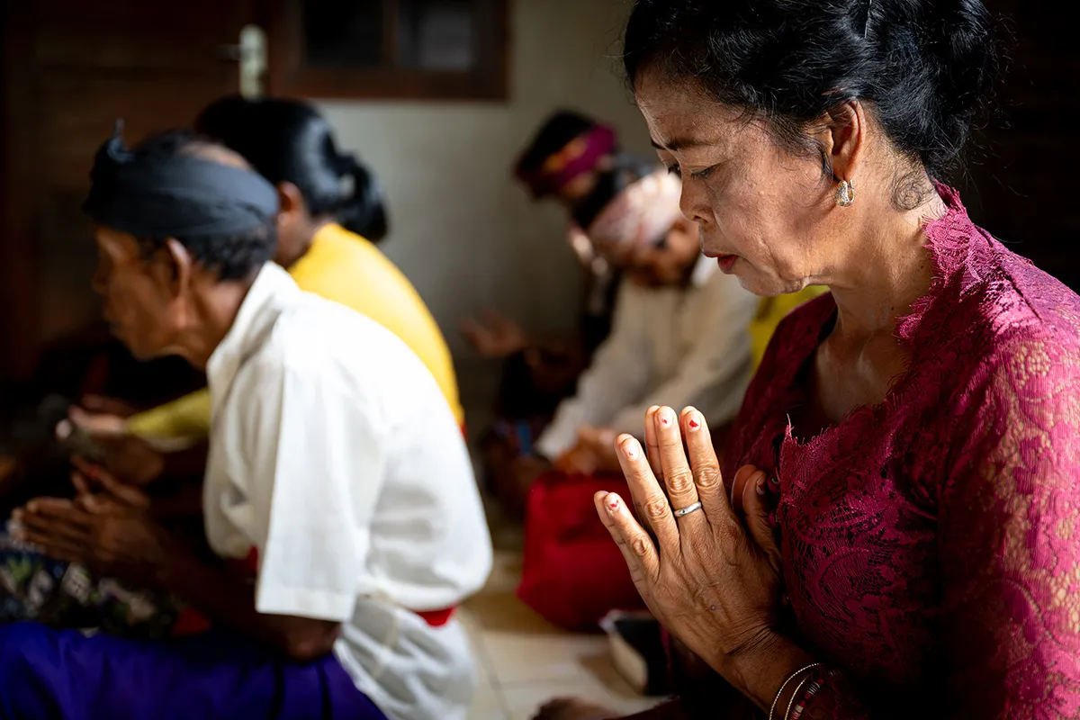 People praying in church service