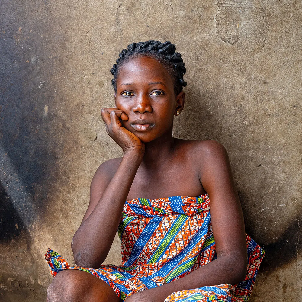Girl resting her head on her hand