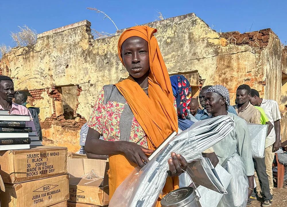 Woman holding action packs