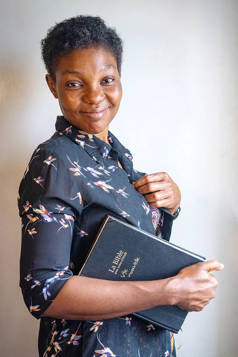 Woman holding bible