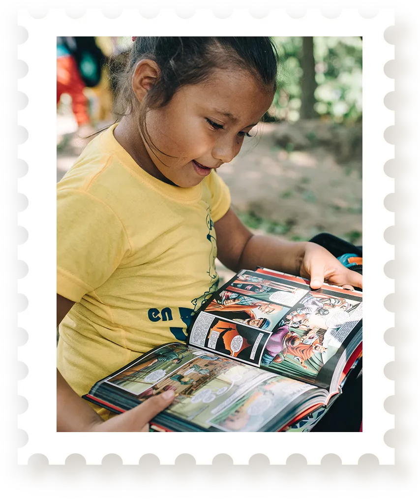 Girl reading illustrated Bible