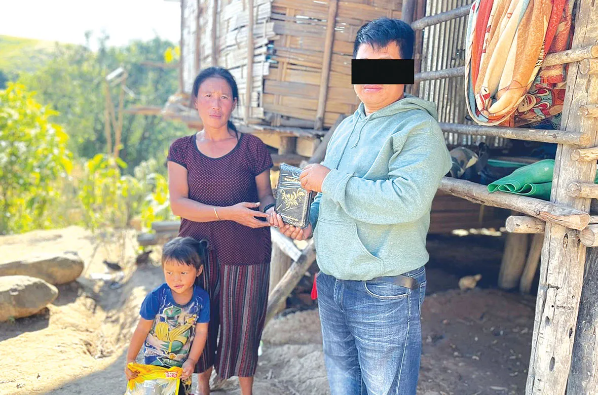 Family showing their Bible