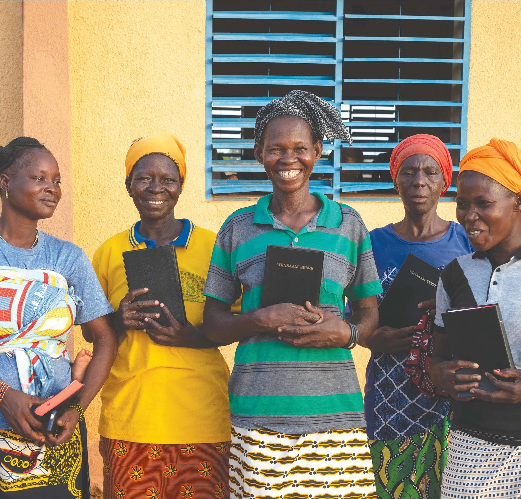 Women holding Bibles