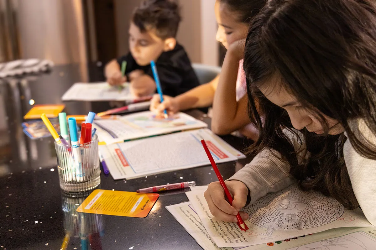 Children engaging with Learn, Grow and Go! resources