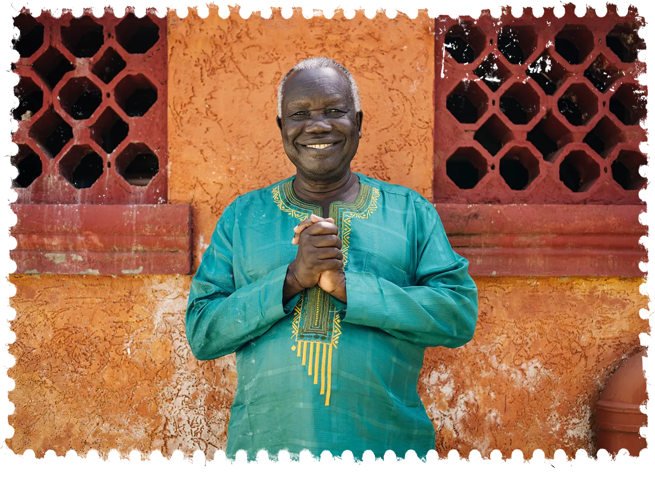 Man standing in front of brihgt wall