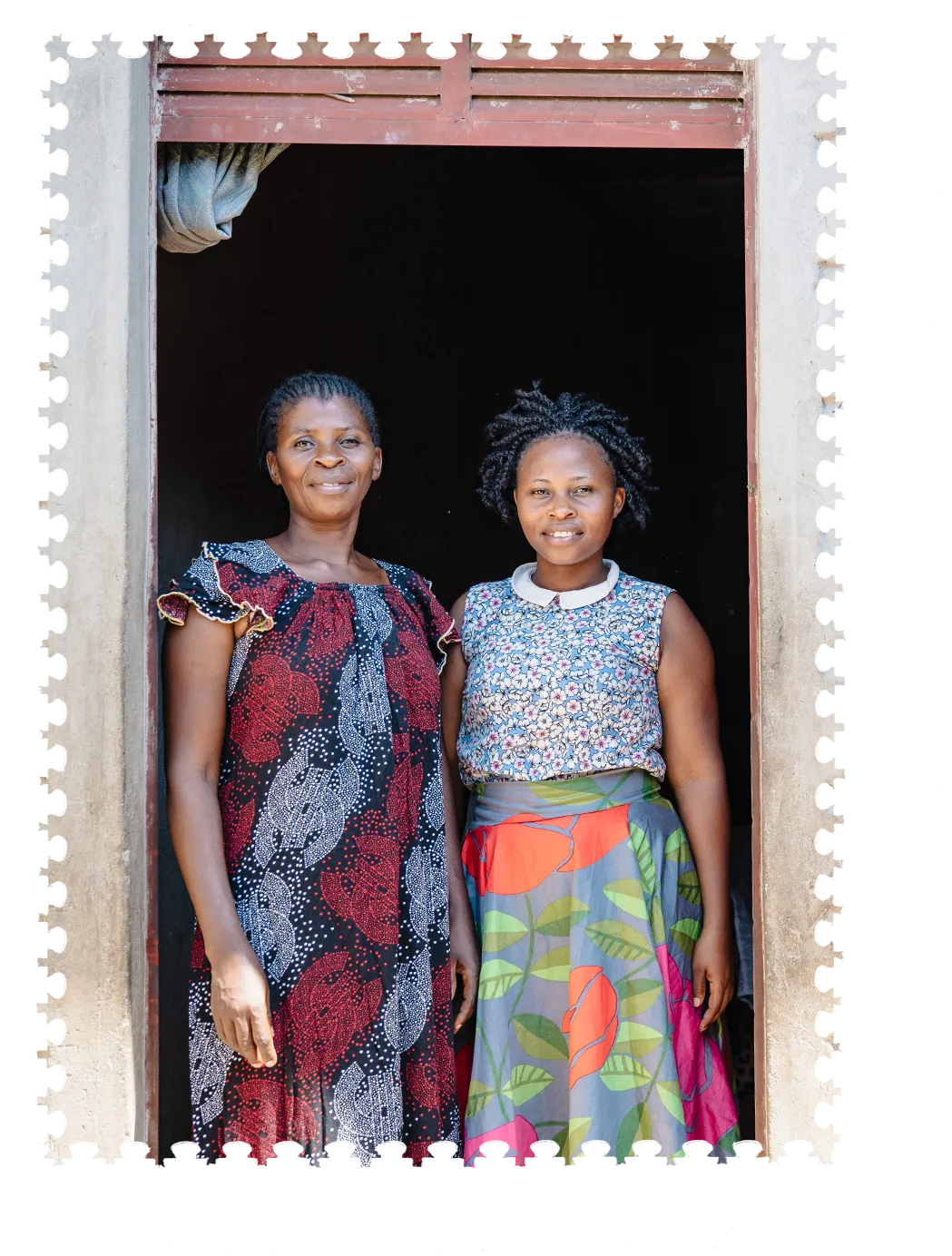 Two women standing in doorway