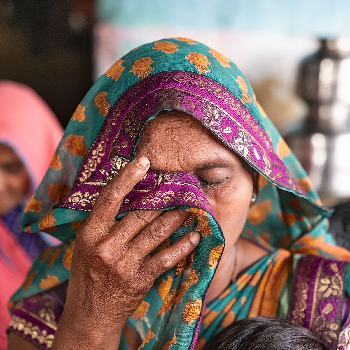 Woman with eyes closed praying