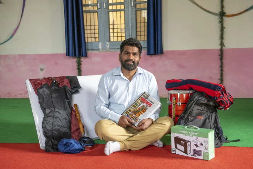 A front-line worker with outreach materials