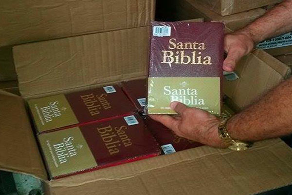 Box of bibles being opened