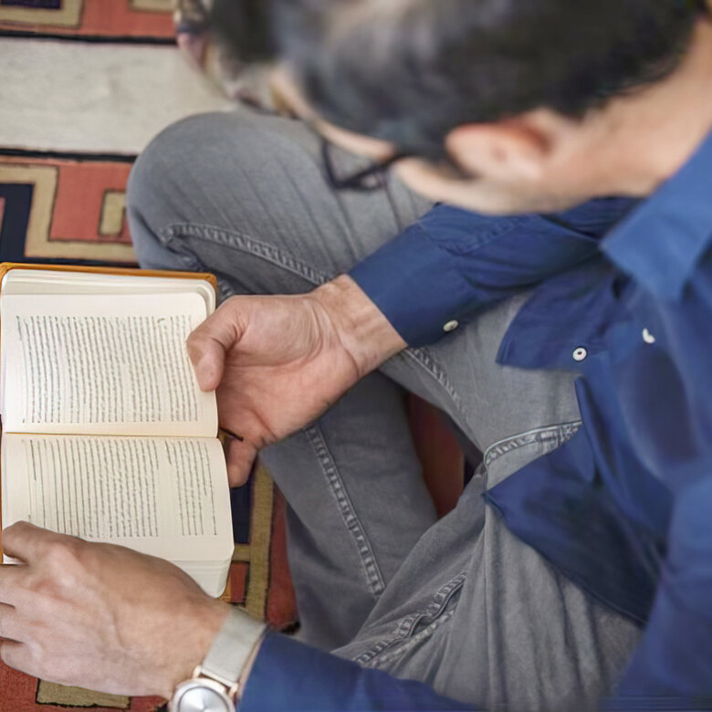 Iranian believer reading a Bible