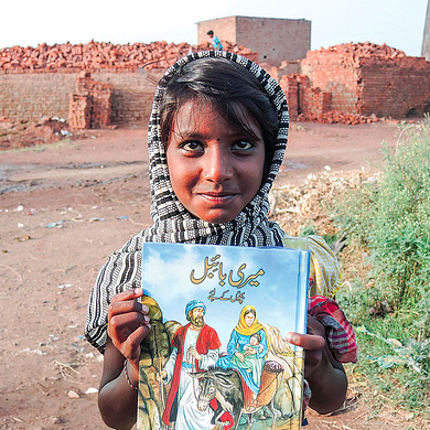 Girl holding book