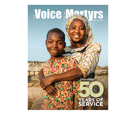 Cover of Newsletter with mother and child and title saying 50 Years of Ministry