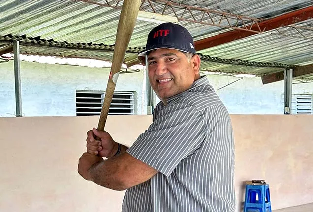Man holding baseball bat