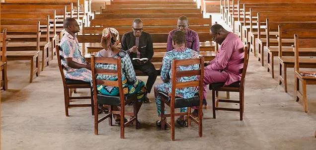 Group of people sitting in a circle
