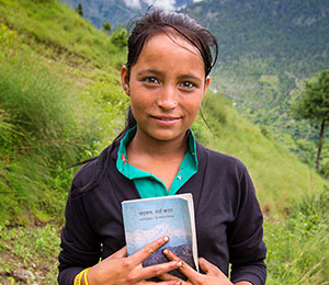 Woman holding open bible