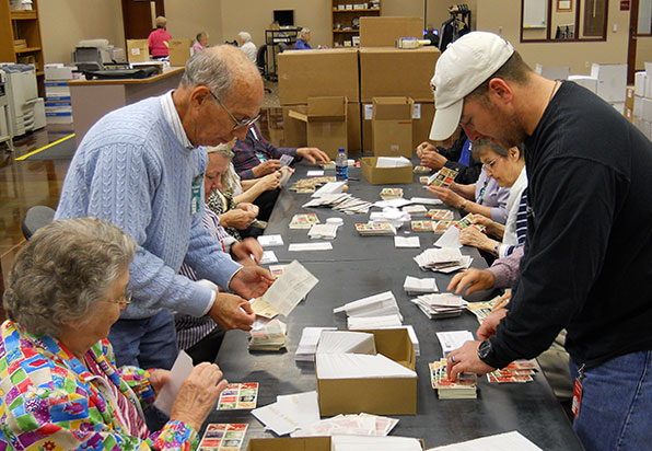 Volunteers filling boxes