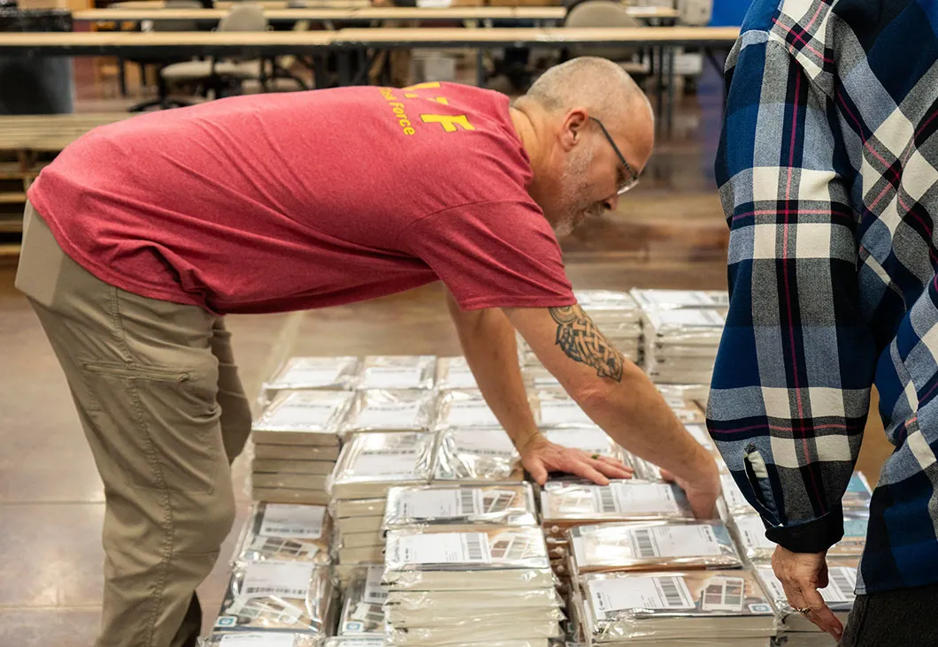 Volunteer loading pallets
