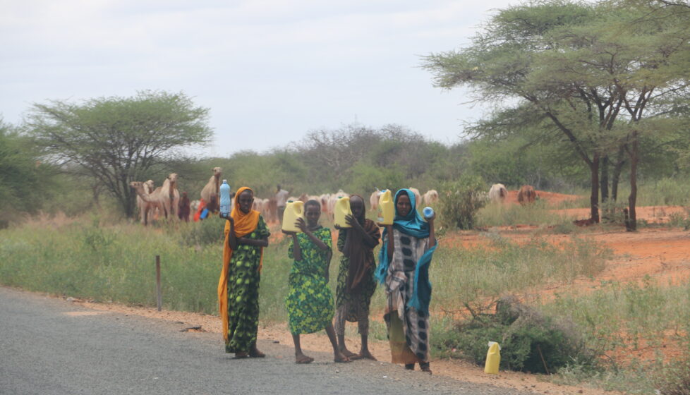 Somali women standing in road