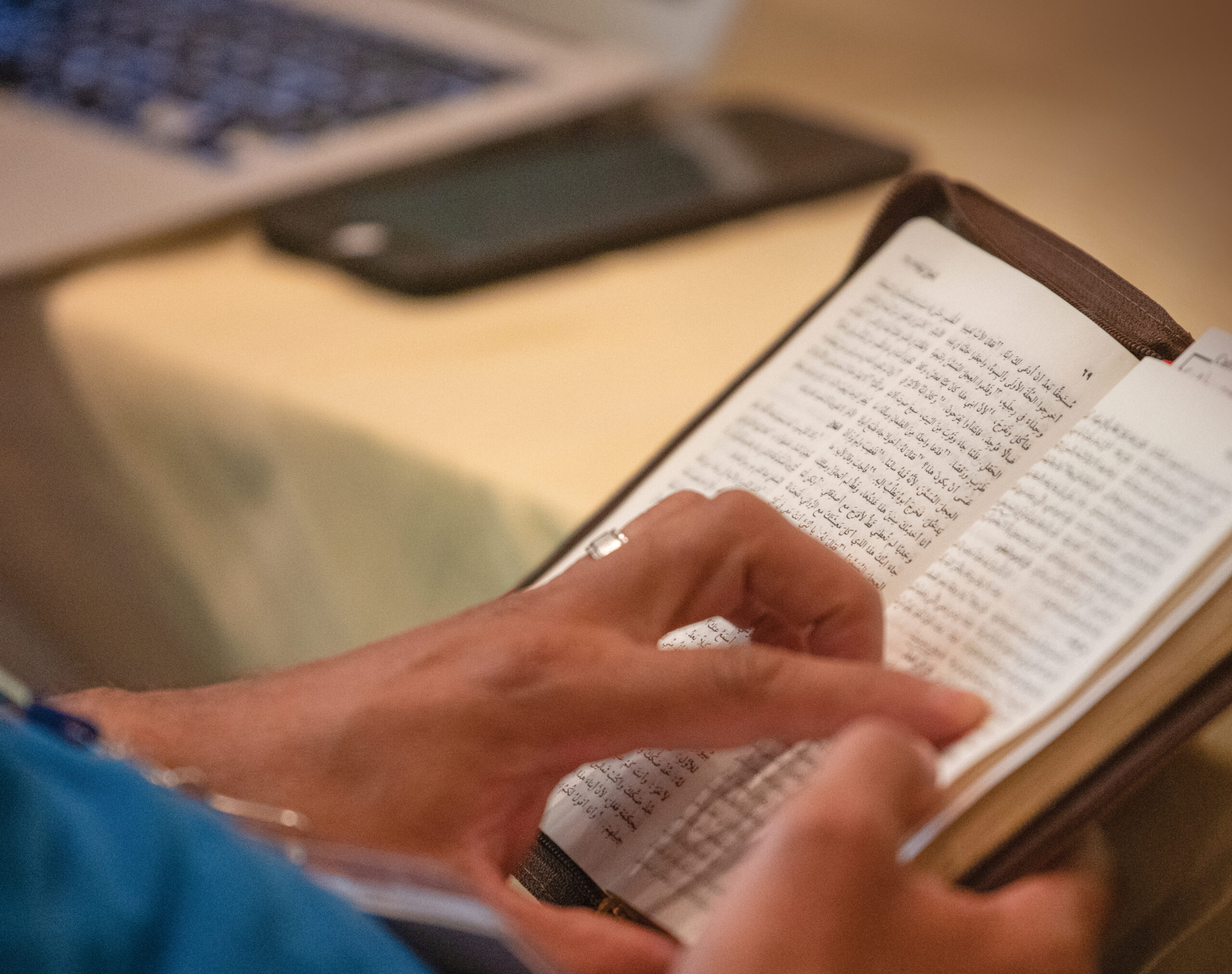 Moroccan man reading Bible