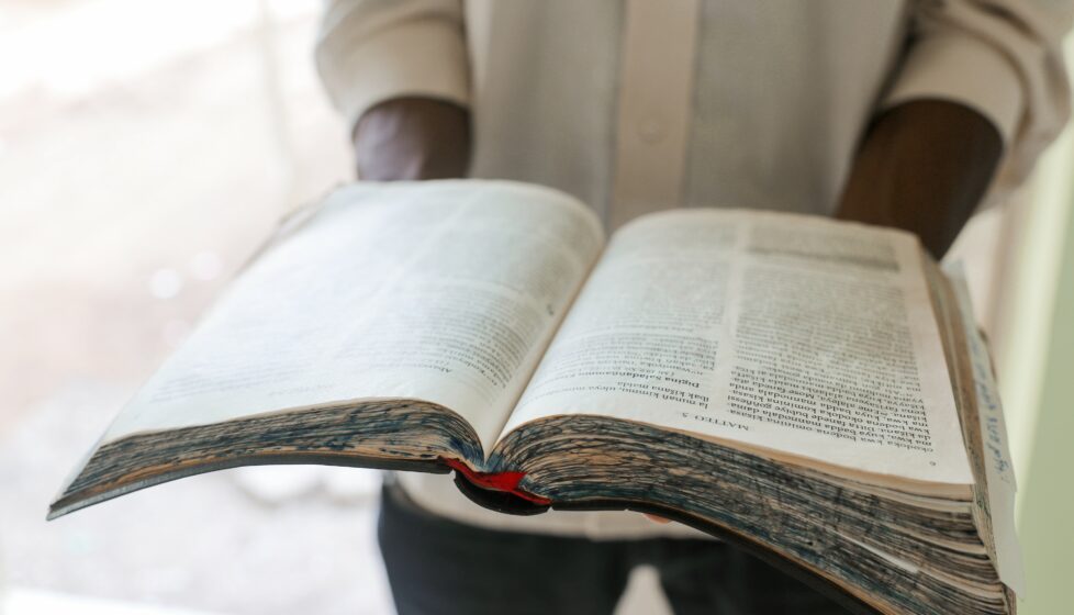man holds a bible