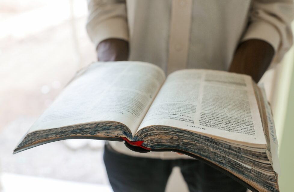 man holds a bible
