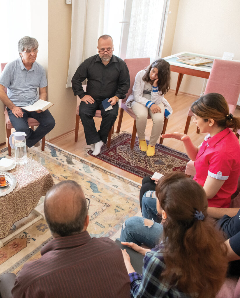 a family sitting in their living room 