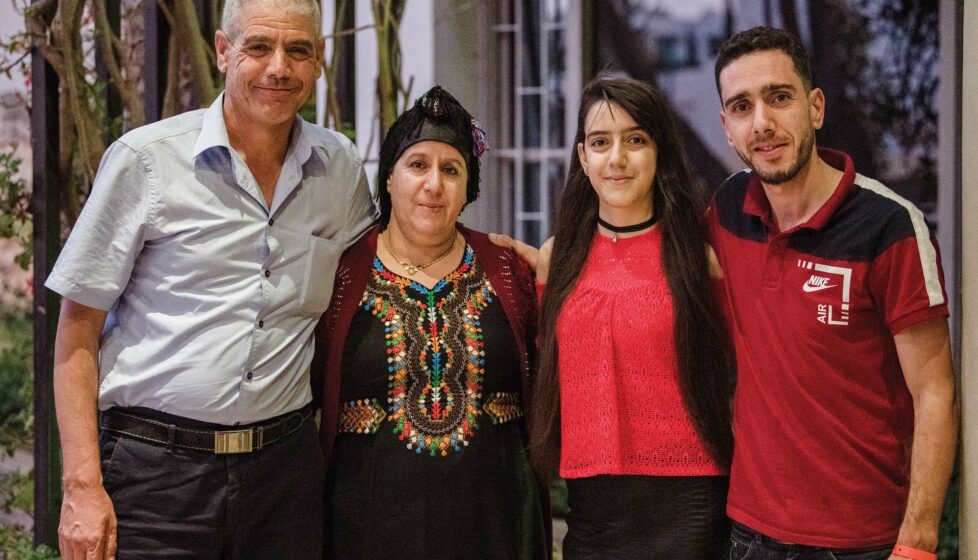 Algerian family standing together smiling