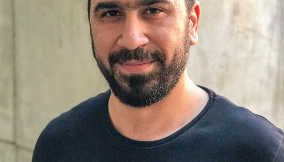 Syrian man smiles