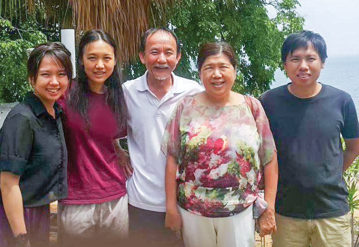 Pastor Koh, his wife, Susanna, and their three children.
