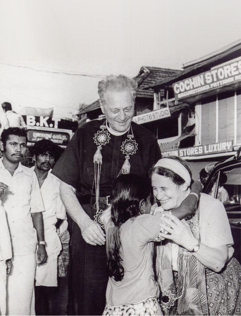 Richard and Sabina Wurmbrand are pictured greeting a young girl with smiles.