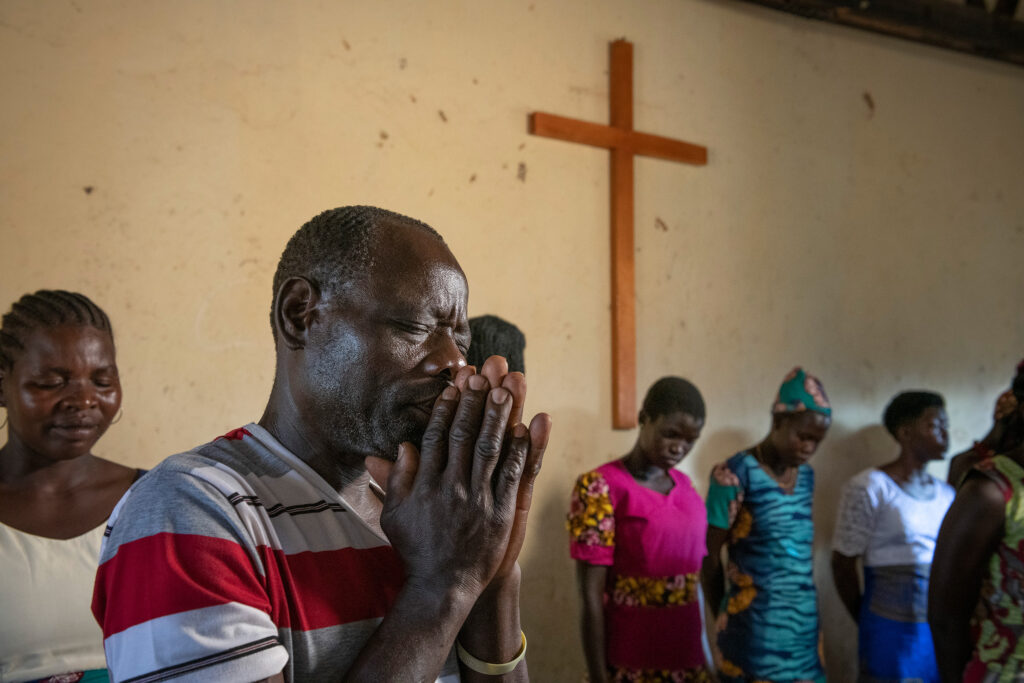 Arigan believers worshiping in church