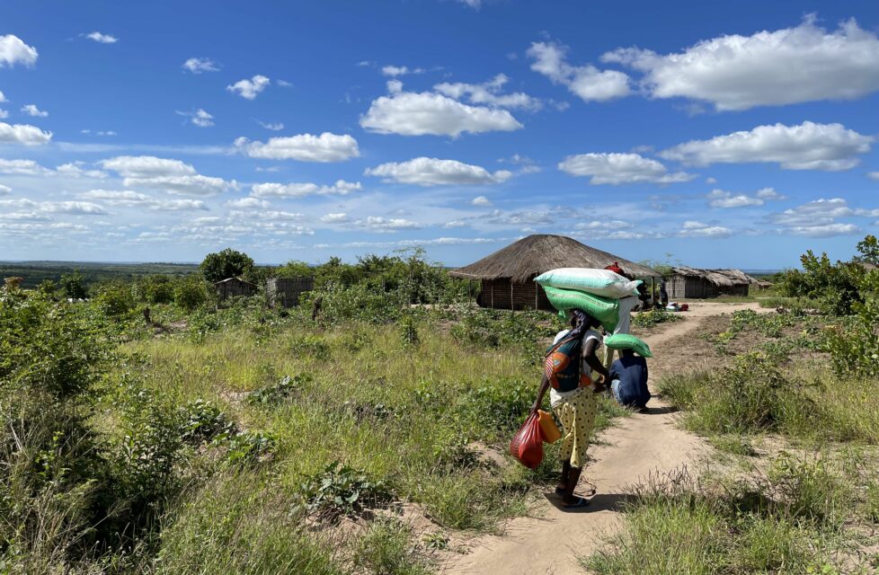 Women walking along a path in remote Africa